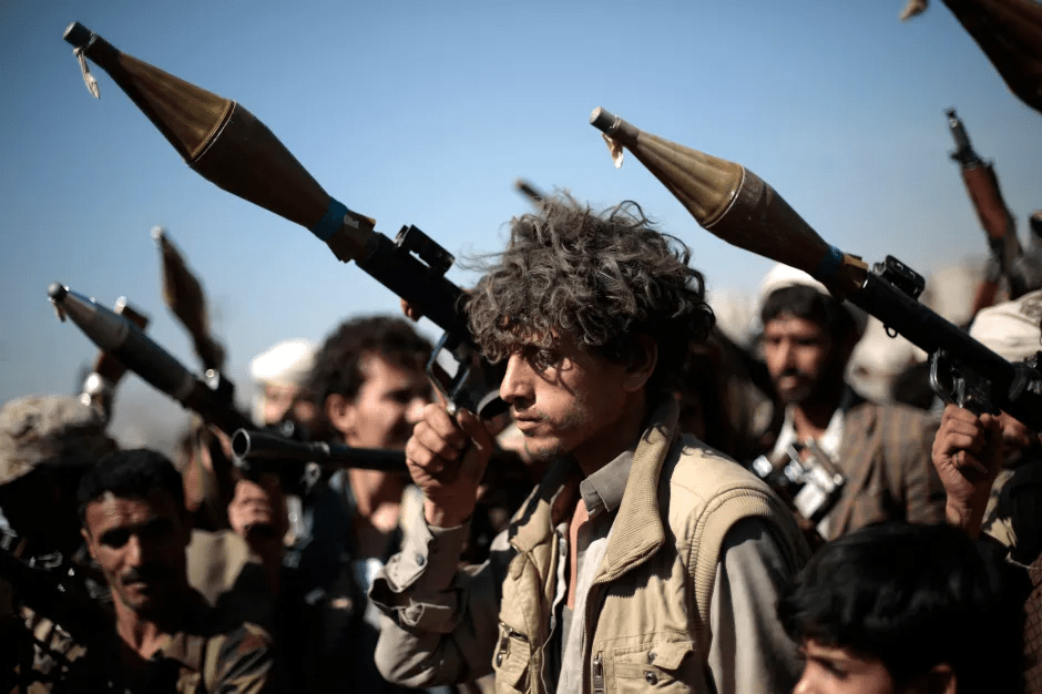 A group of men holding rocket-propelled grenades.