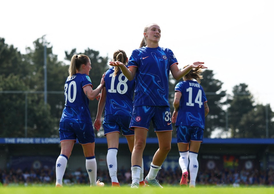 Chelsea's Agnes Beever-Jones celebrates scoring a goal.
