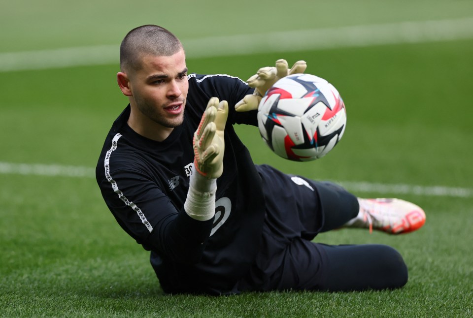 Lille's Lucas Chevalier warming up before a soccer match.