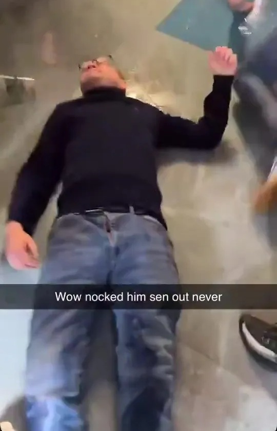 Person lying on the floor.