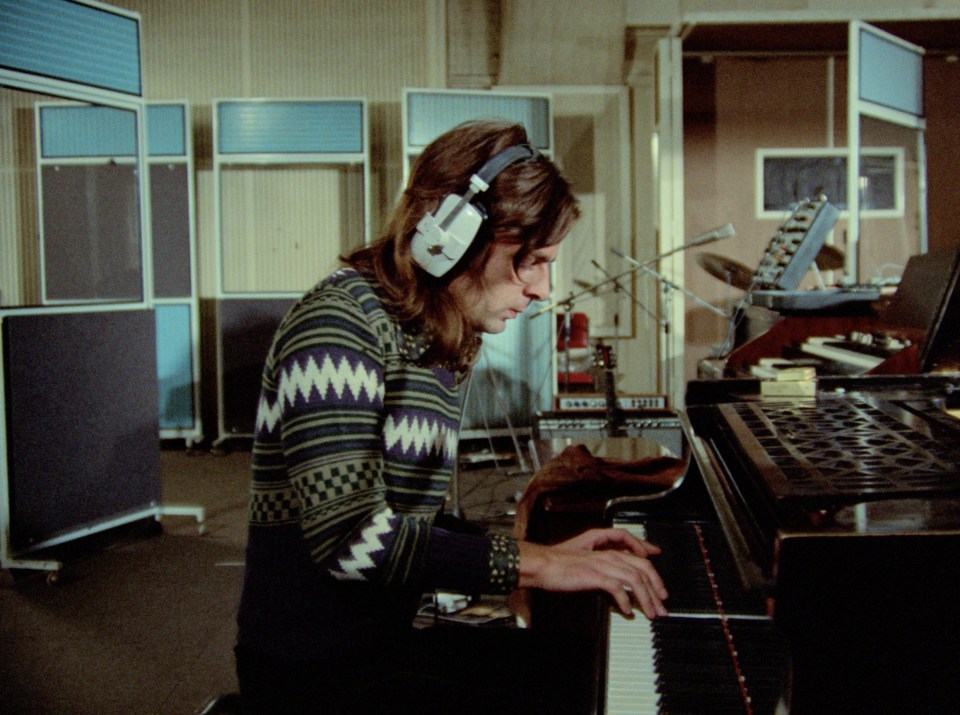 Pink Floyd at Pompeii: a man playing a piano in a recording studio.