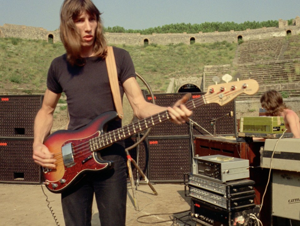 Roger Waters of Pink Floyd playing bass guitar at Pompeii.
