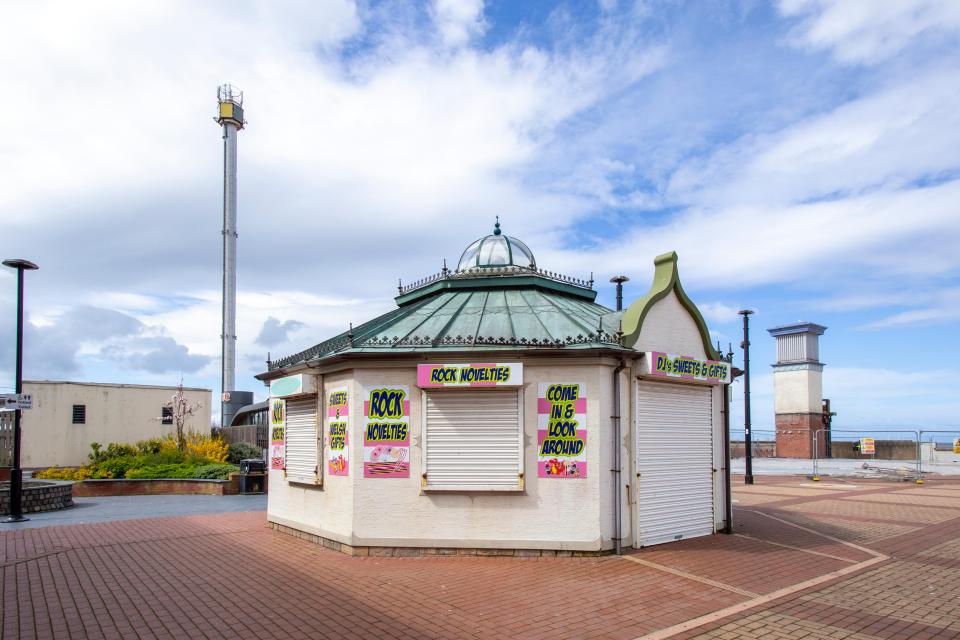 Closed sweet shop on a promenade.