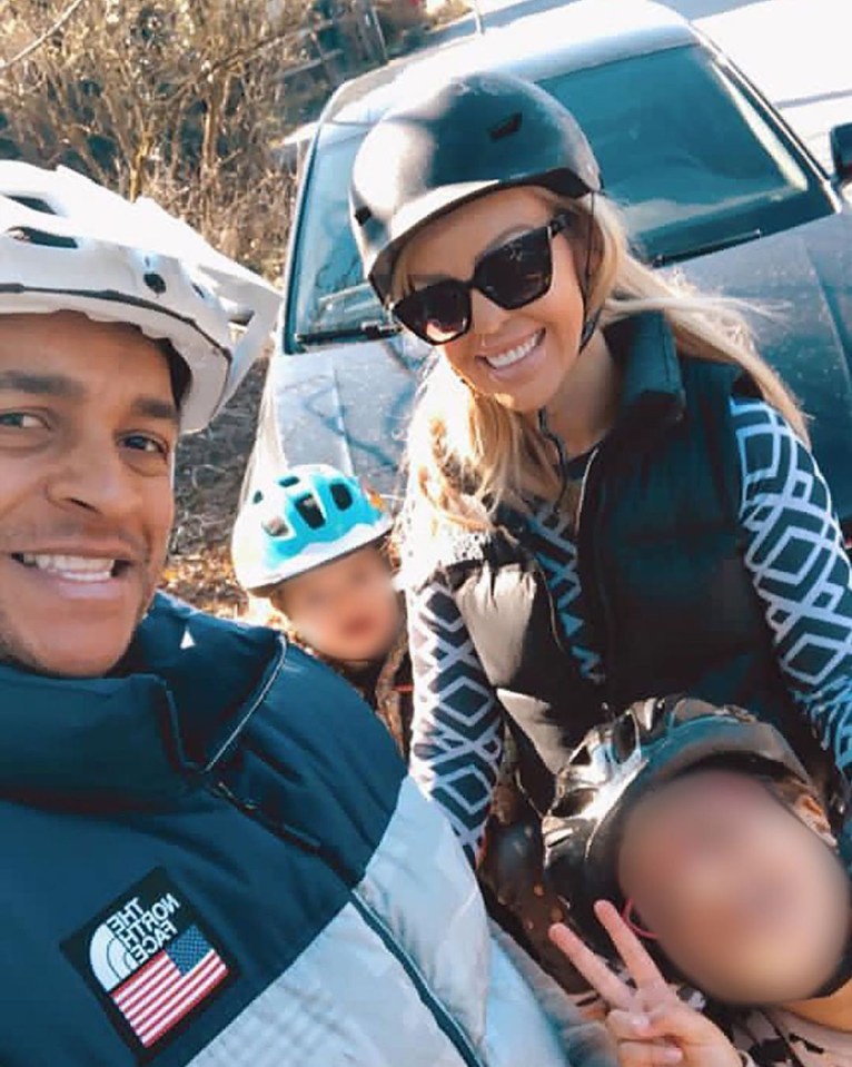 Family wearing bike helmets.
