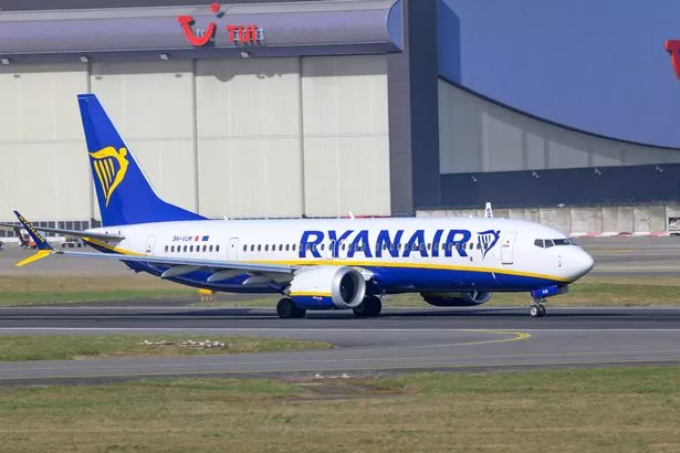 Image of a Ryanair plane taking off on an airport tarmac