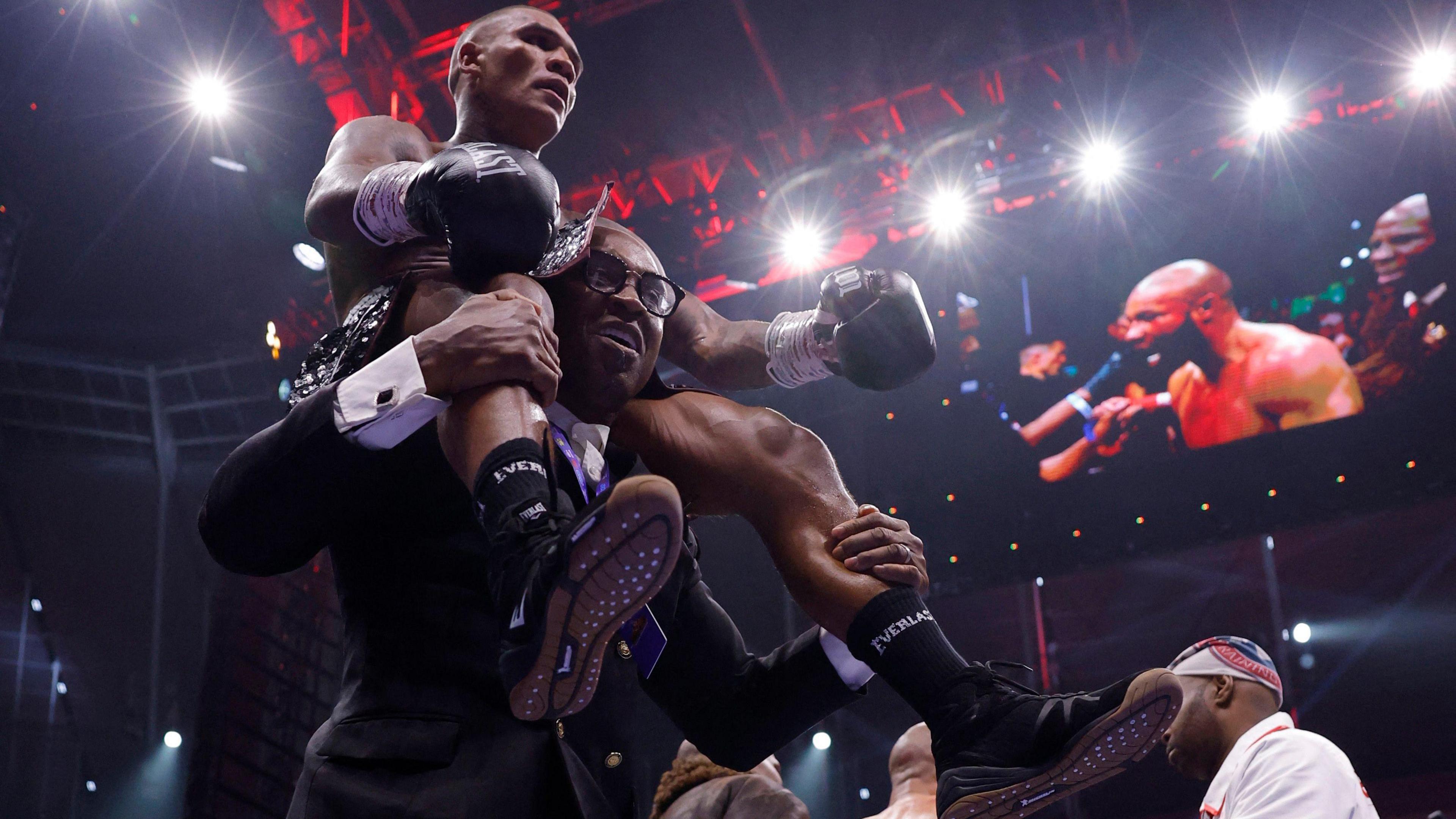Conor Benn is on the shoulders of his father Nigel Benn