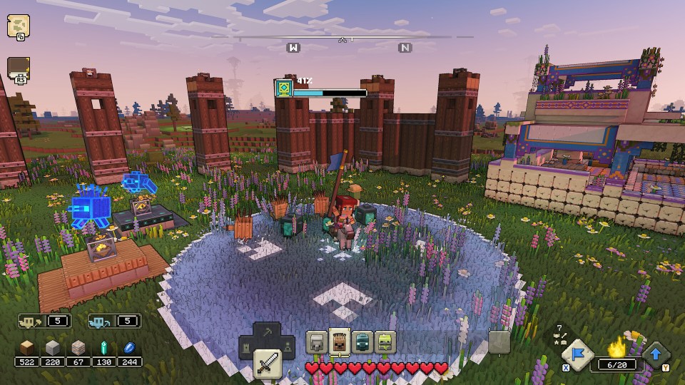 Screenshot of a video game showing a player character in a field near a wooden wall and building.