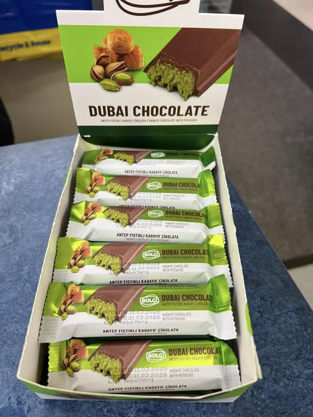 Box of Dubai Chocolate bars with pistachios.
