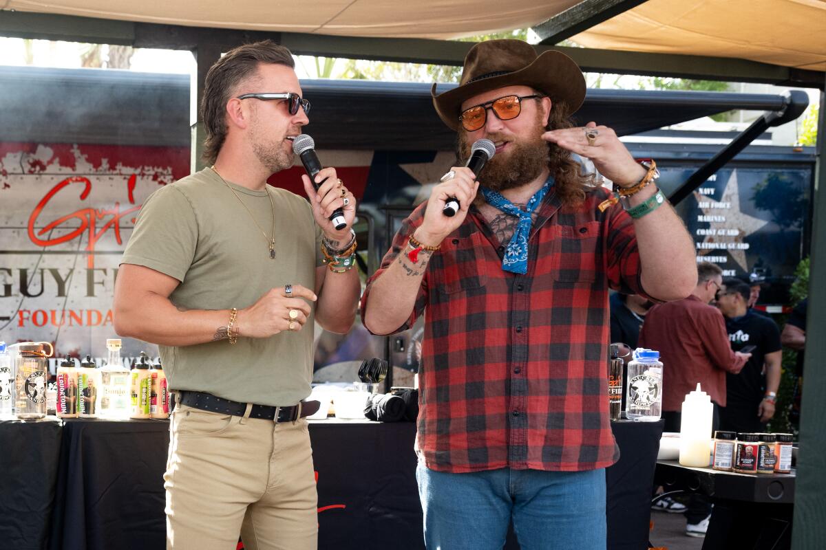 T.J. Osborne and John Osborne of Brothers Osborne sing at Stagecoach on Friday.