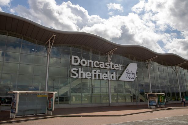 The Doncaster Sheffield Robin Hood international airport, outside the front entrance taken on a part cloudy sunny day. in West Yorkshire