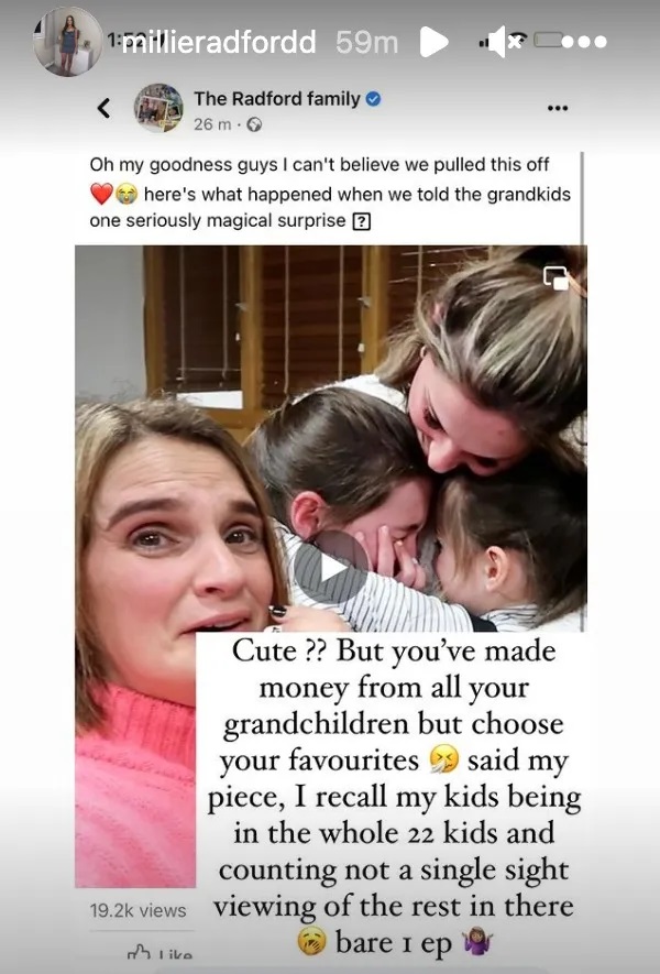 Screenshot of a social media post showing a woman embracing her grandchildren, with text expressing mixed feelings about the situation.