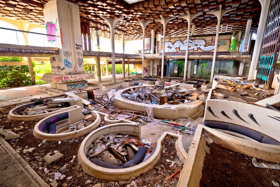 Ruined interior of an abandoned luxury hotel.