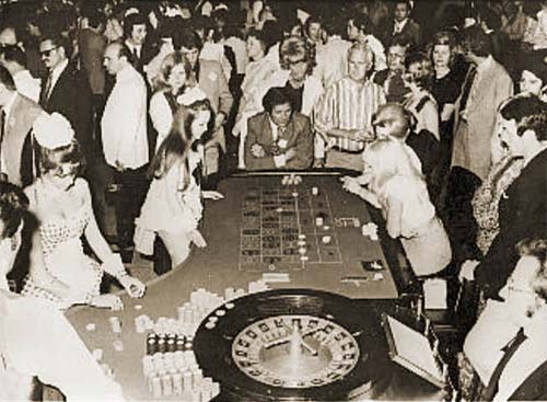 Illustration of a crowded casino with people playing roulette.