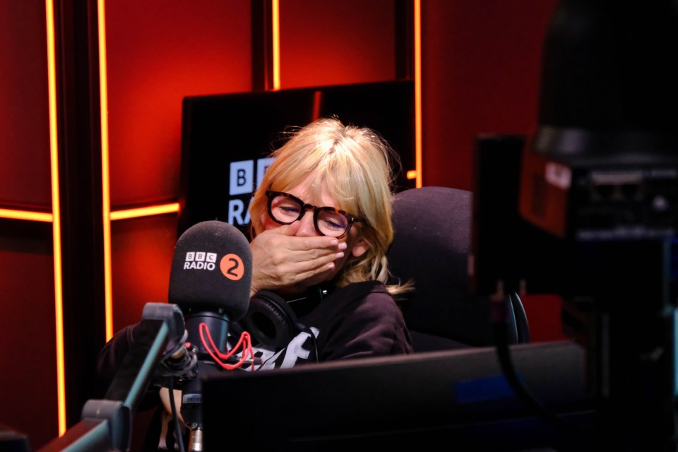 Zoe Ball covering her mouth while presenting her last show on BBC Radio 2.