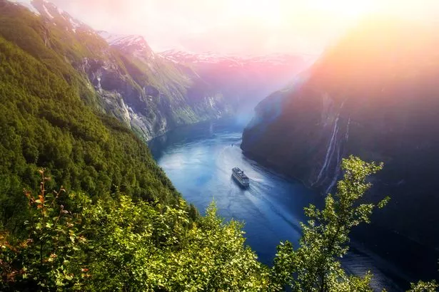Breathtaking view of Sunnylvsfjorden fjord and famous Seven Sisters waterfalls, near Geiranger village in western Norway.