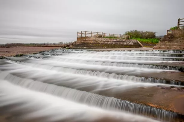 Long exposure of the waterfall on Dunster beach