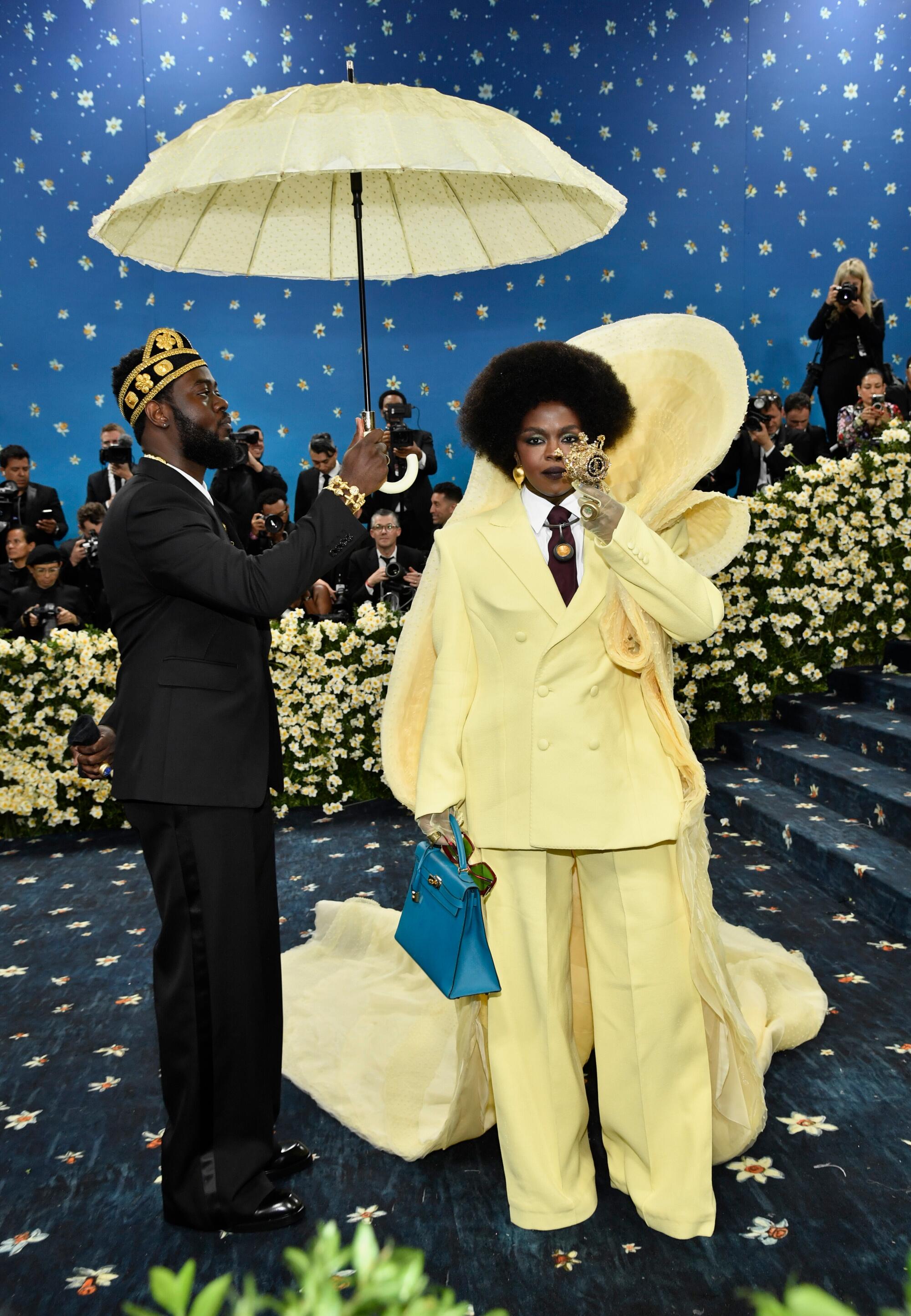 Lauryn Hill wears Jude Dontoh.