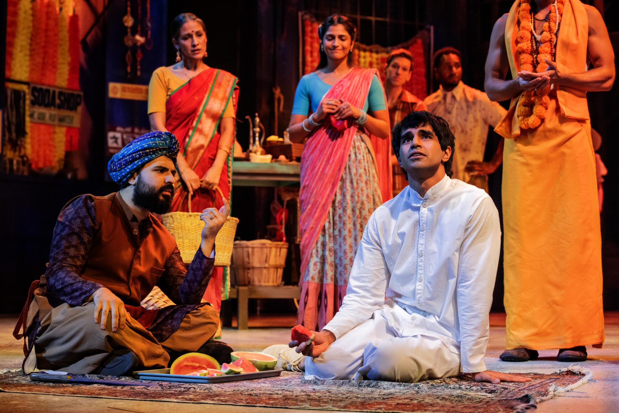 Pragun Bhardwaj, left, Taha Mandviwala and the national tour cast of "Life of Pi" at the Ahmanson.