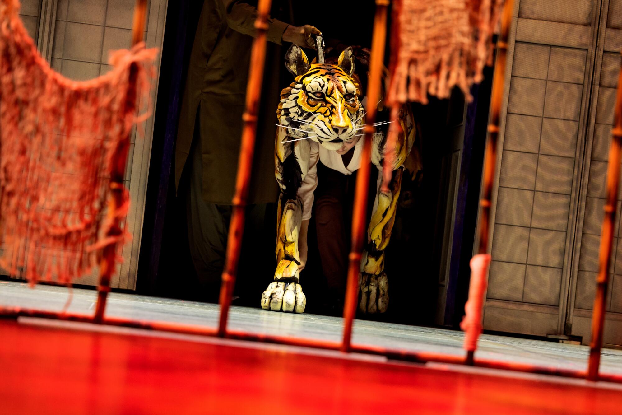 Puppeteers Anna Leigh Gortner, Shiloh Goodin and Toussaint Jeanlouis in the national tour of "Life of Pi" at the Ahmanson.