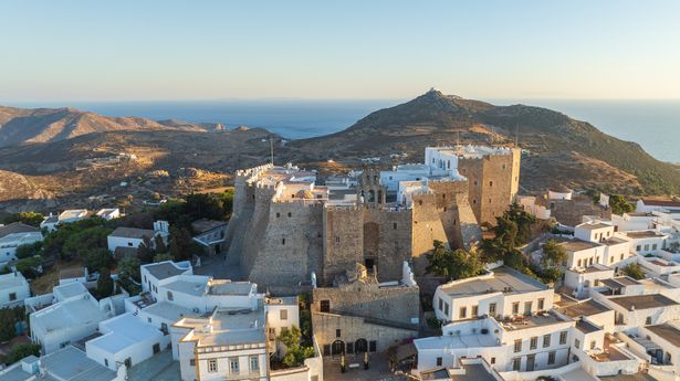 This is a drone photo of the Holy Monastery of Saint John the Theologian on Patmos town, Greece. It dates from the 11th century and in 1999 it was declared a UNESCO World heritage site