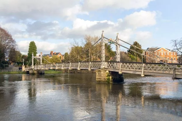HEREFORD, UK - 22nd February 2022 - Landscape of high river levels of River Wye at the Victoria Bridge in Hereford after flooding, Hereford, England, United Kingdom.