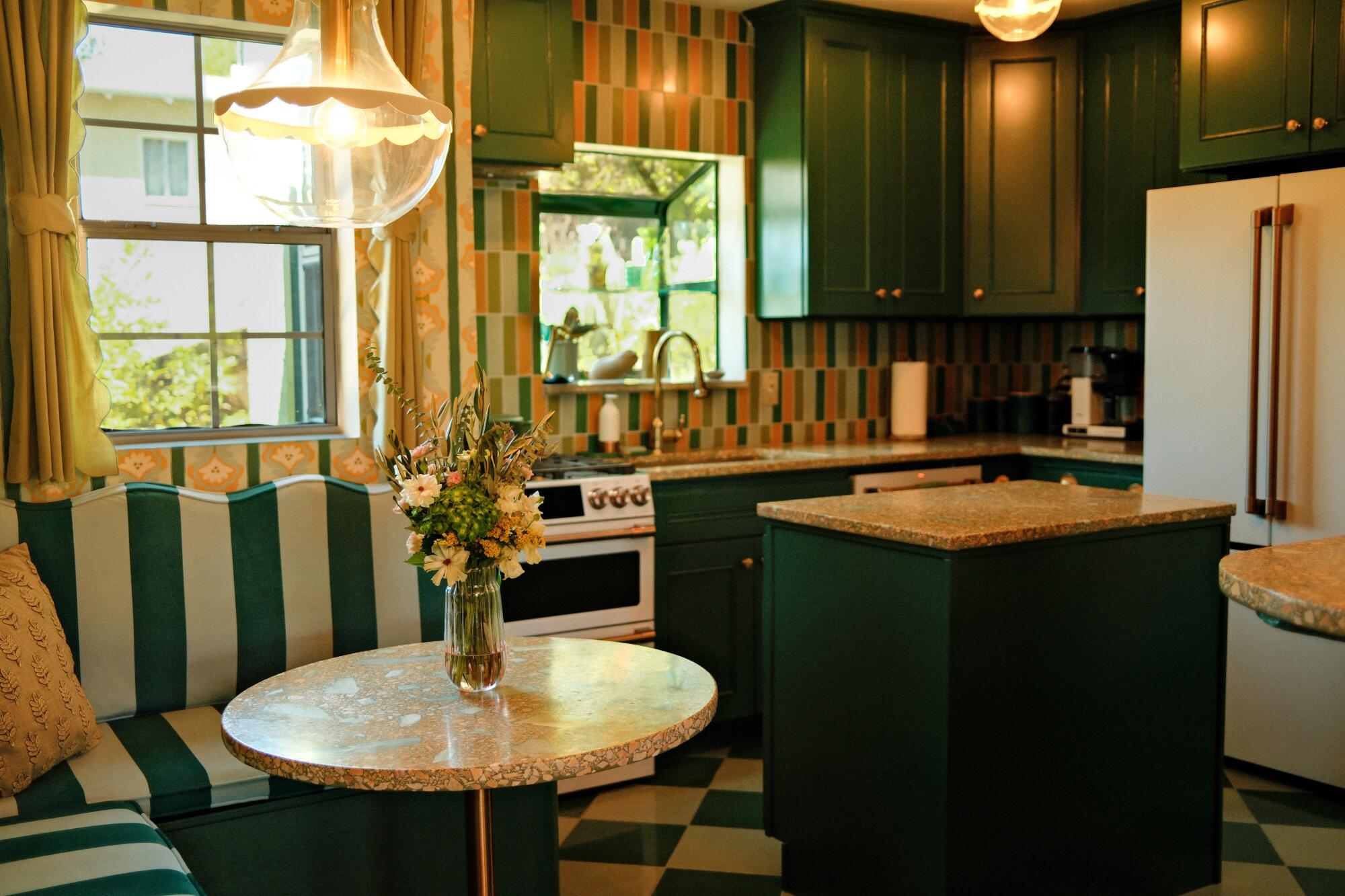 A green and yellow kitchen with stripes and checkerboard floor