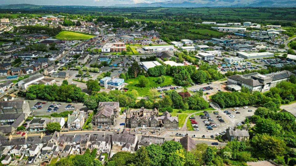 Aerial view of a Jacobean mansion in Wales for sale.