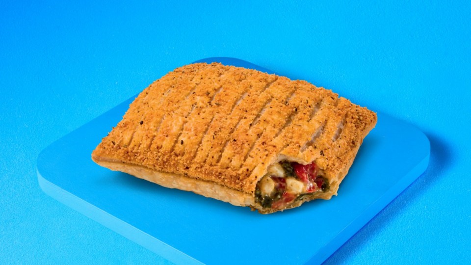 Pastry filled with spinach and red peppers.