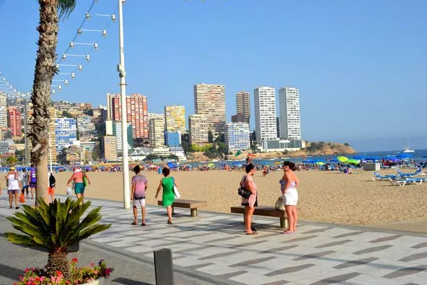 Benidorm, Alicante, Spain - August 9, 2019: People on the beach of Benidorm