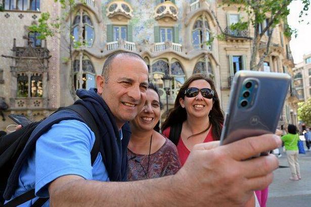 Several people taking a selfie