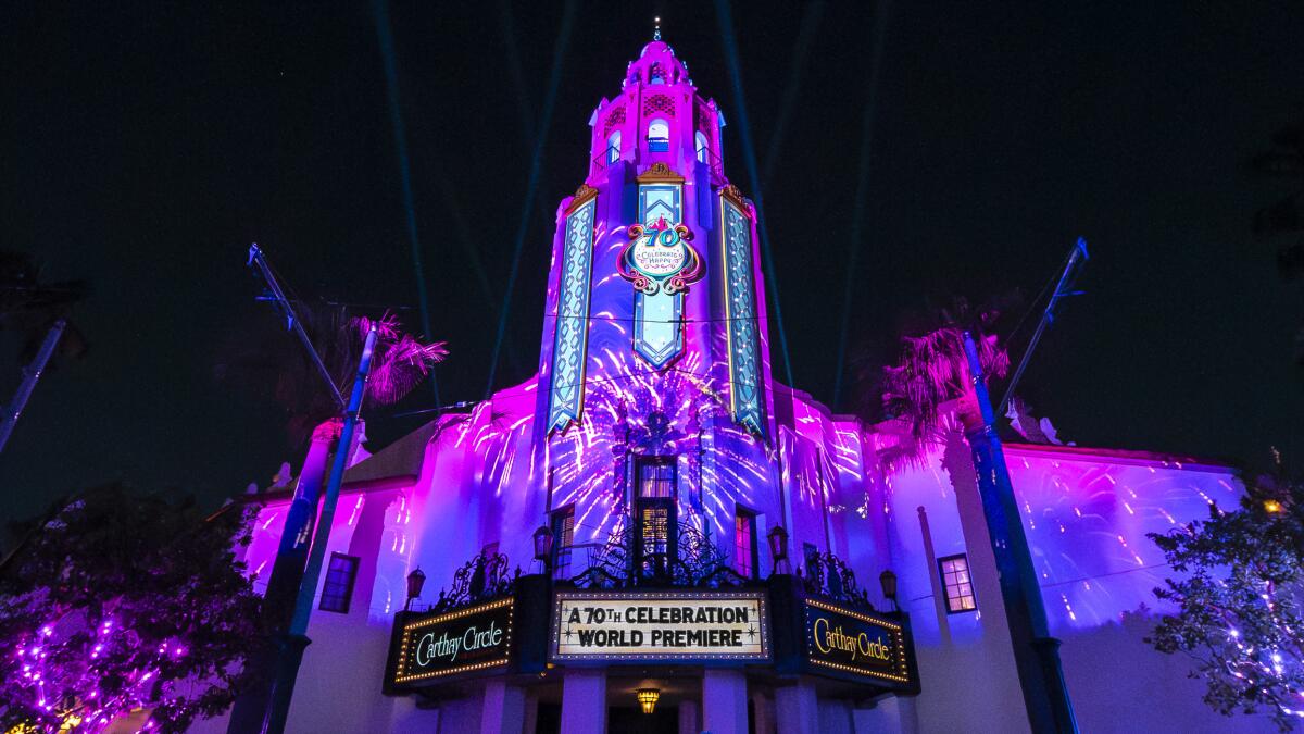 Fireworks projected on a white building