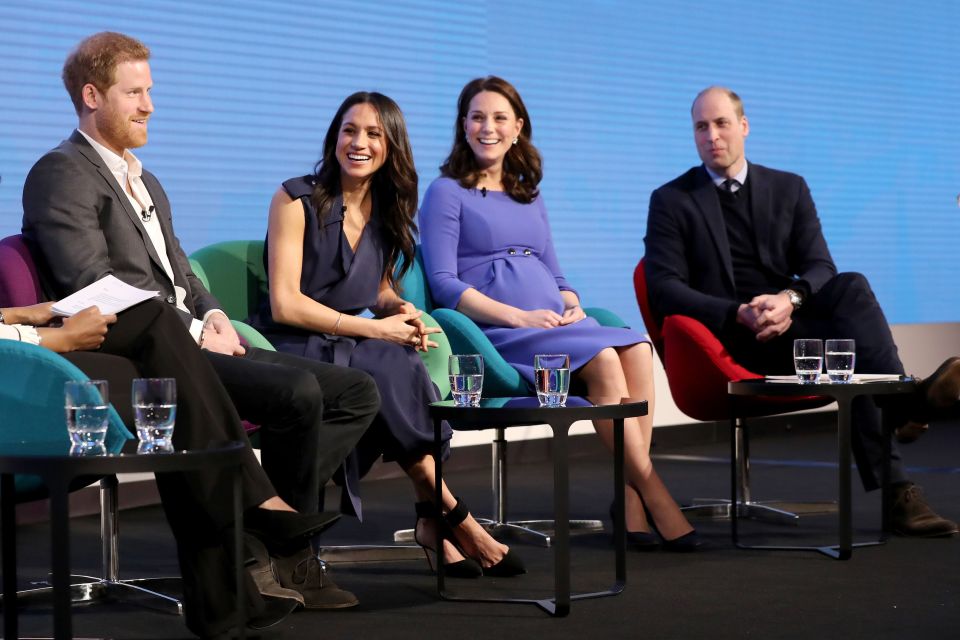 Prince Harry, Meghan Markle, Kate Middleton, and Prince William sitting on chairs at a forum.
