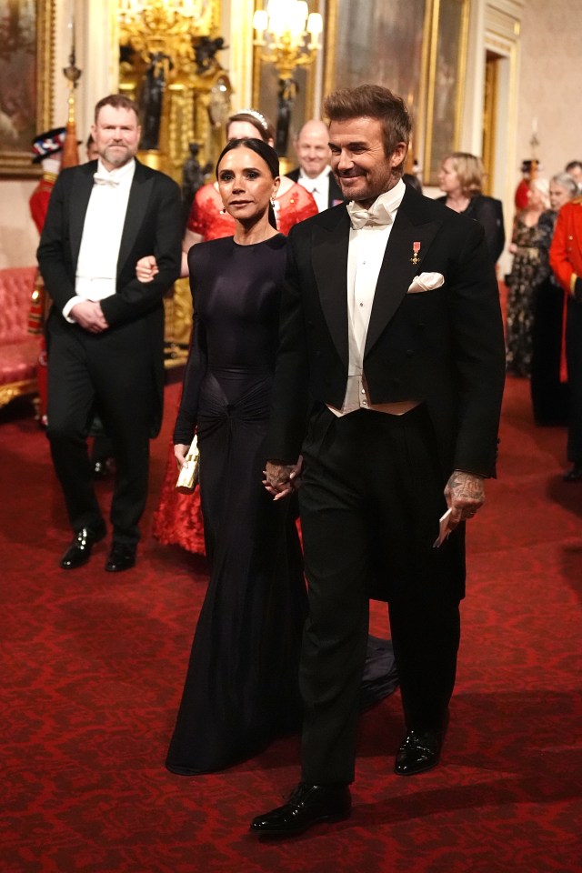 David and Victoria Beckham at Buckingham Palace.