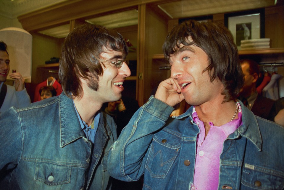 Liam and Noel Gallagher at a Tommy Hilfiger store opening.