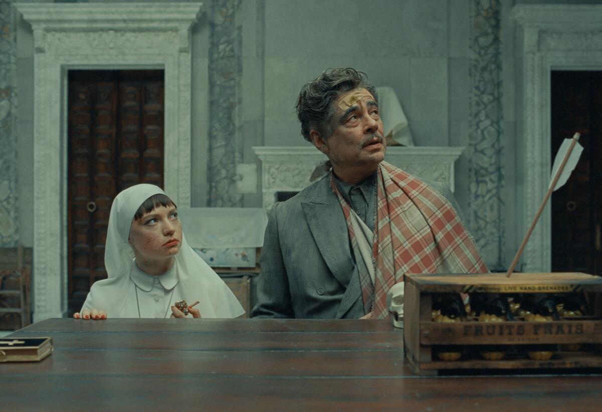 A nun and a man with his arm in a sling have an arrow shot at them.