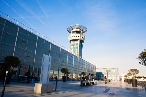 Paris, France, May 2016: View of Orly international Airport entrance in early morning.