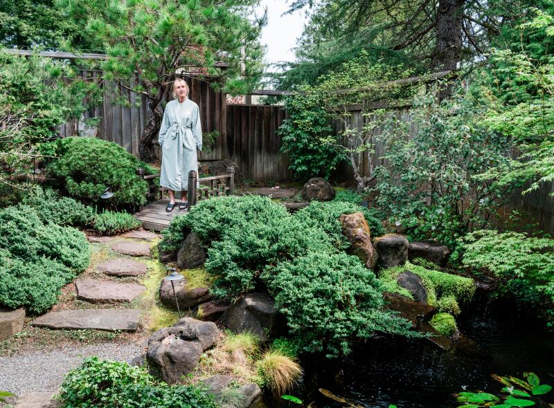 FREESTONE, CA -- MARCH 29, 2025: Simone Wilson explores the Japanese tea garden before taking the cedar enzyme bath. Wellness Editor Alyssa Bereznak in an enzyme cedar bath at the Osmosis Day Spa in Freestone, California on Saturday, March 29, 2025. (Andri Tambunan / For The Times)