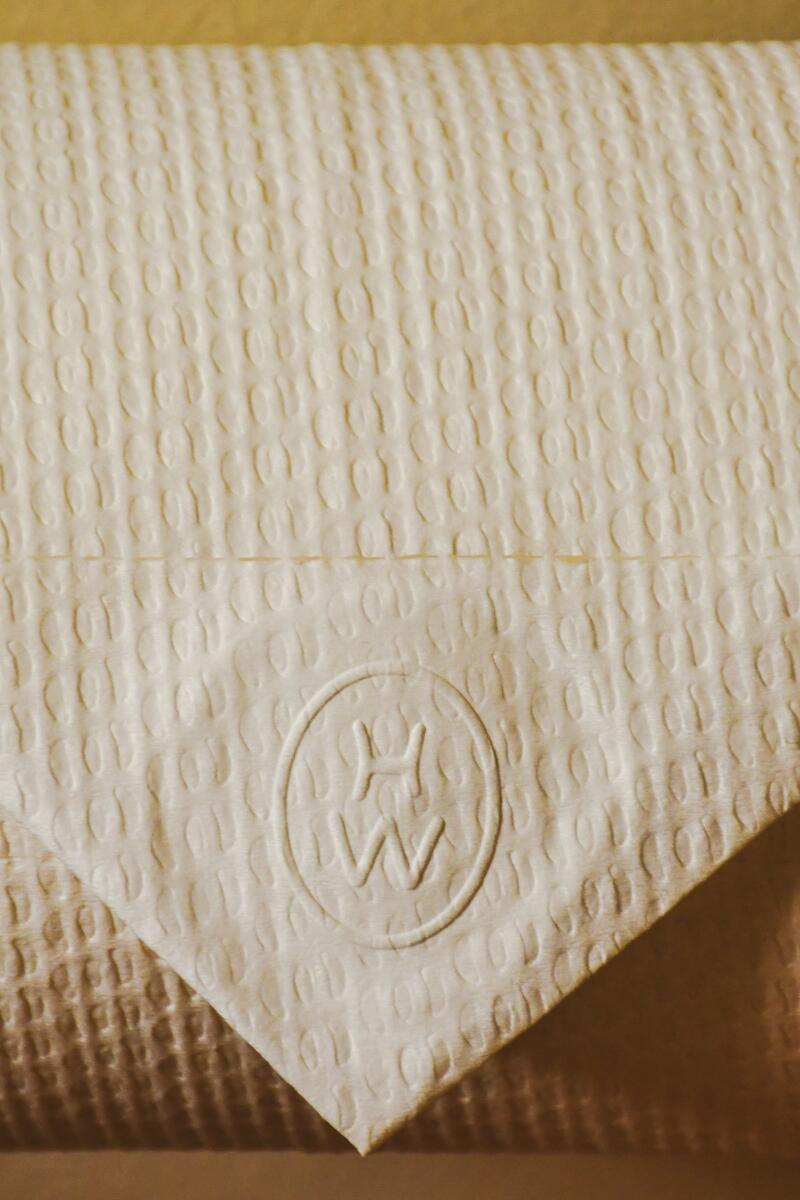 The toilet paper at the Hotel Wren is marked with its initials.