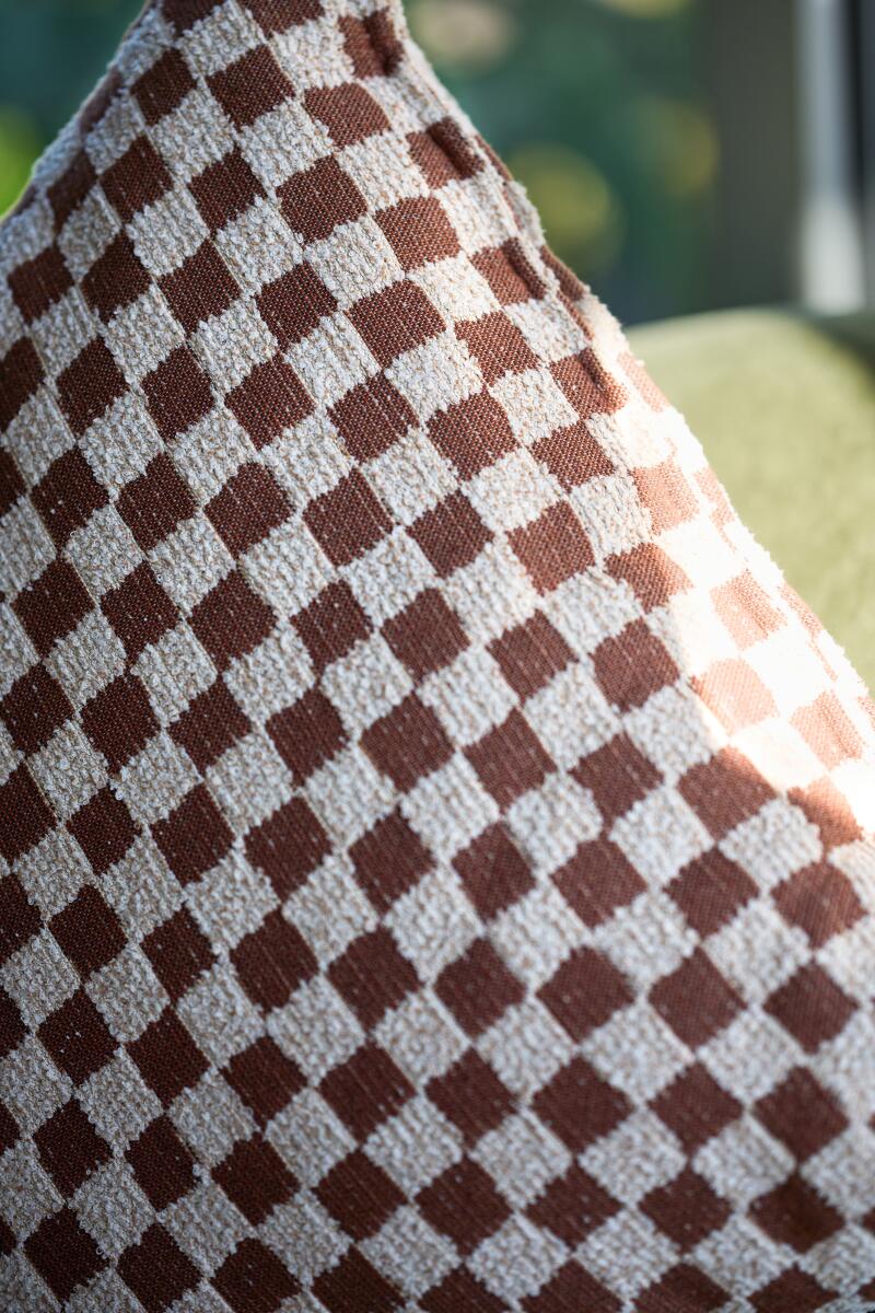 A detail of a patio pillow at The Pearl Hotel.