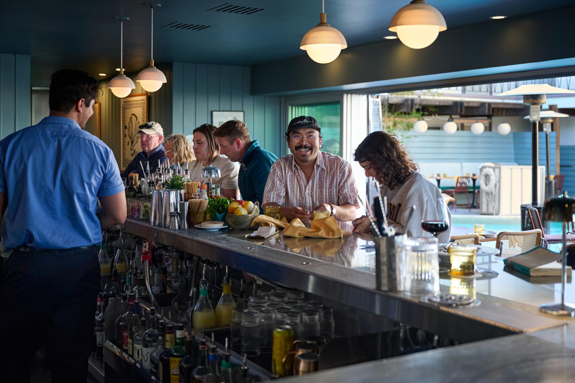 Happy guests at restaurant-bar Ponyboy at the Pearl Hotel in San Diego.