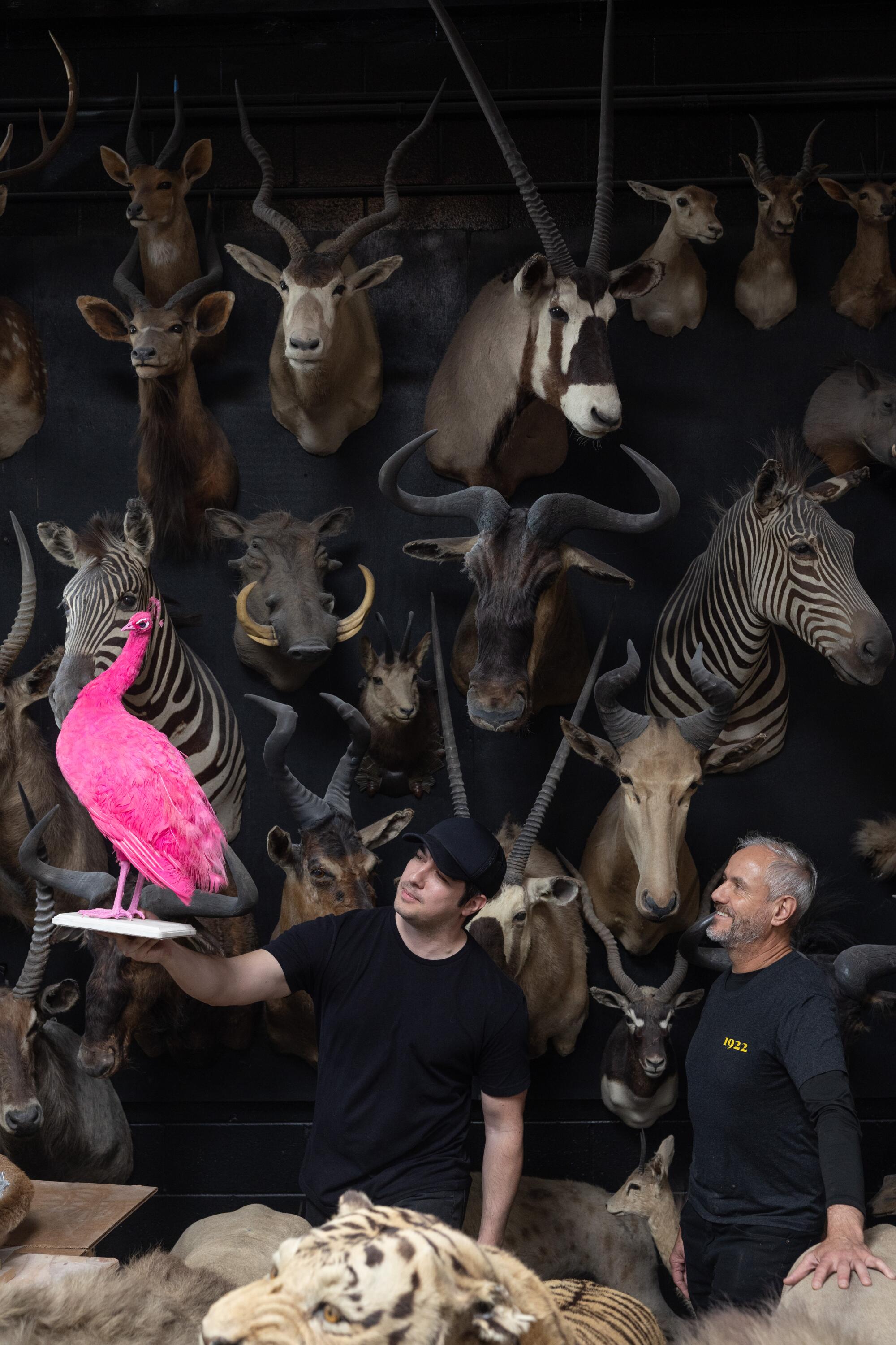 Ace Rodriguez, left, and Rey Macias are co-owners of Bischoff's Pet Preservation in North Hollywood.
