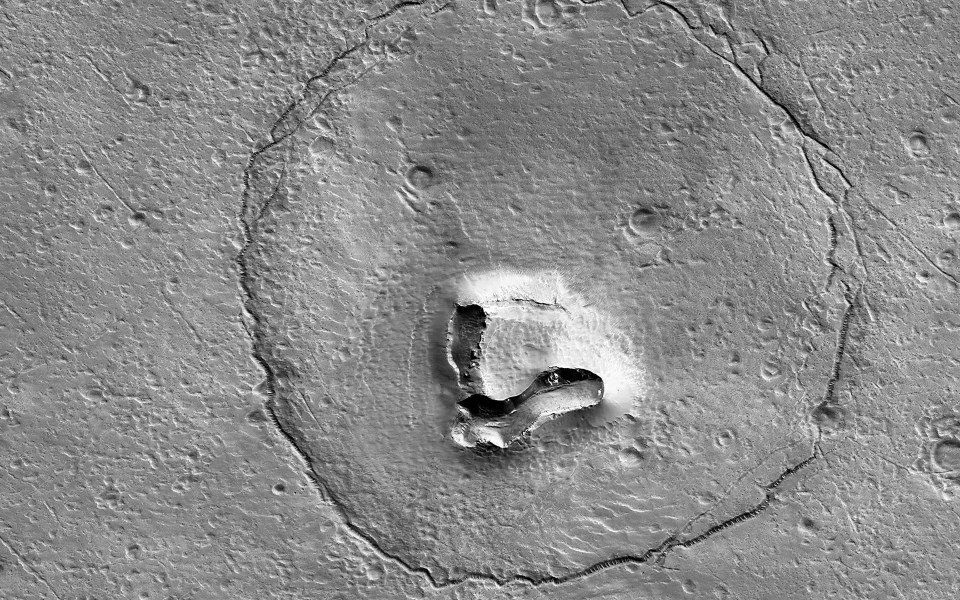 Overhead view of a bear-shaped impact crater.