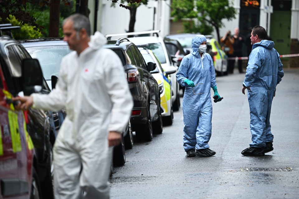 Police forensics officers at the scene of a fire at UK Prime Minister Keir Starmer's home.