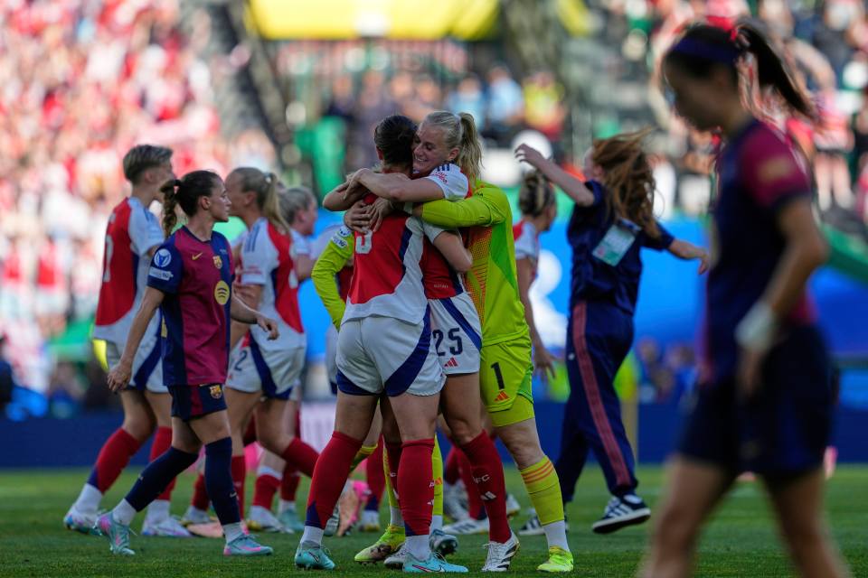 Arsenal's Stina Blackstenius celebrates with teammates after a soccer match.