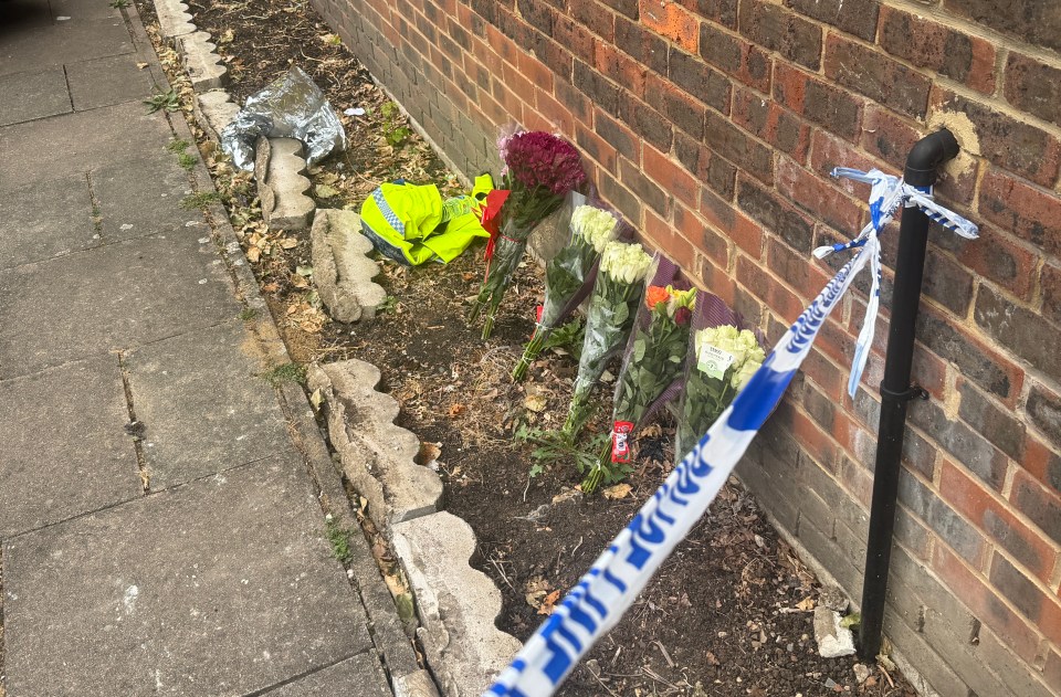 Floral tributes at a crime scene.