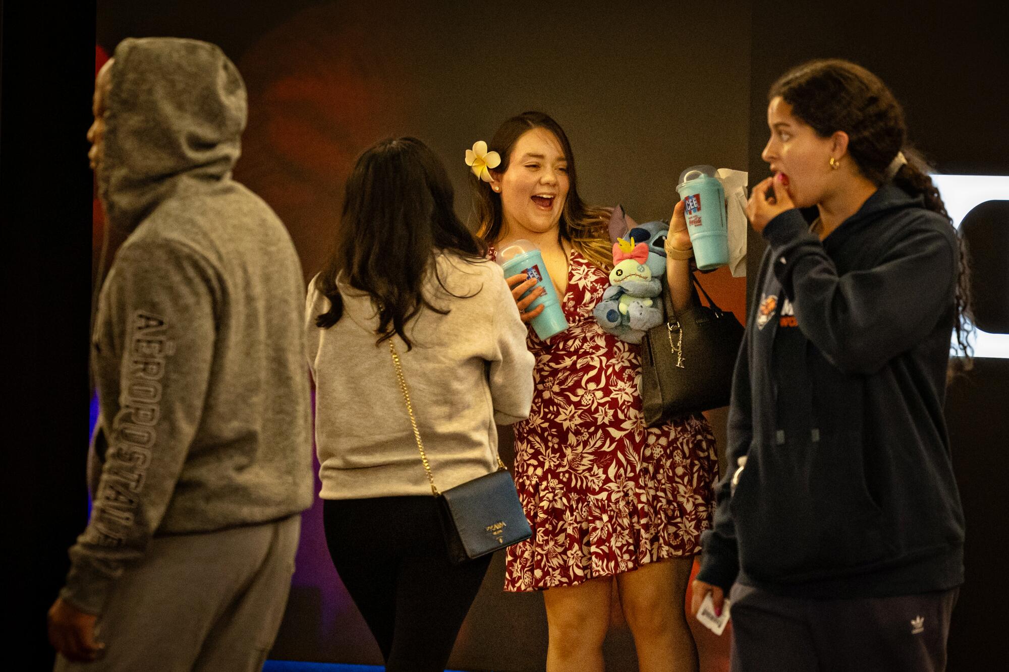 Moviegoers head to showings of "Lilo & Stitch"
