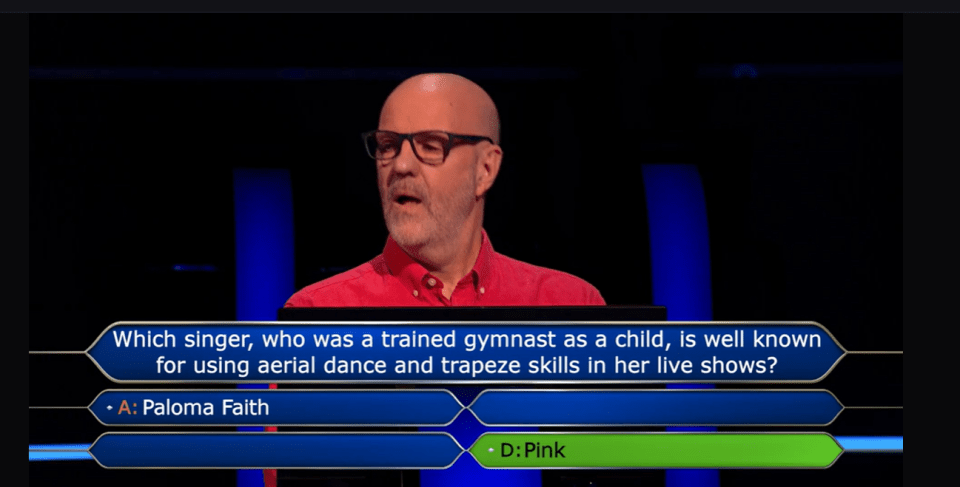Screenshot of Who Wants To Be A Millionaire? contestant answering a question about a pop star known for using aerial dance and trapeze skills in her live shows.