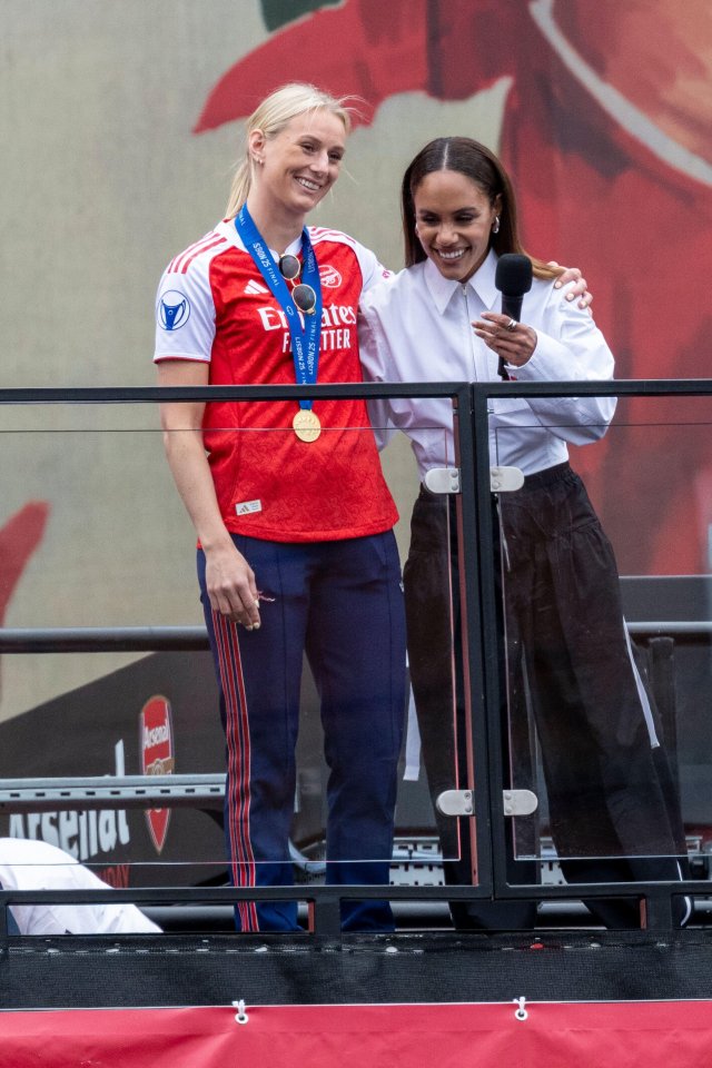 Stina Blackstenius, wearing an Arsenal jersey and medal, being interviewed by Alex Scott.