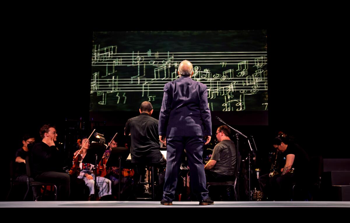 Omar Ebrahim as Schoenberg and conductor Neal Stulberg in Tod Machover's "Schoenberg in Hollywood" at UCLA Nimoy Theater.
