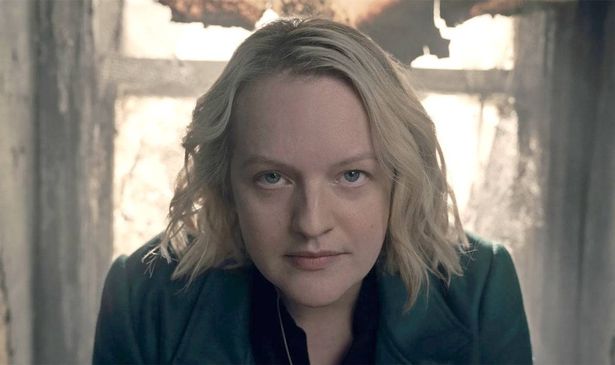 A woman looks serious